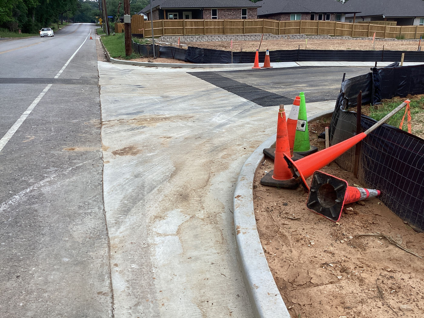 Road, curb, and adjacent sitework